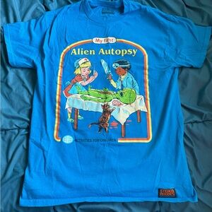 Steven Rhodes Blue Graphic Tee with Alien Autopsy Design